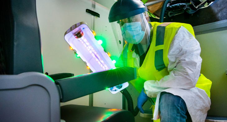Worker using Boeing UV wand