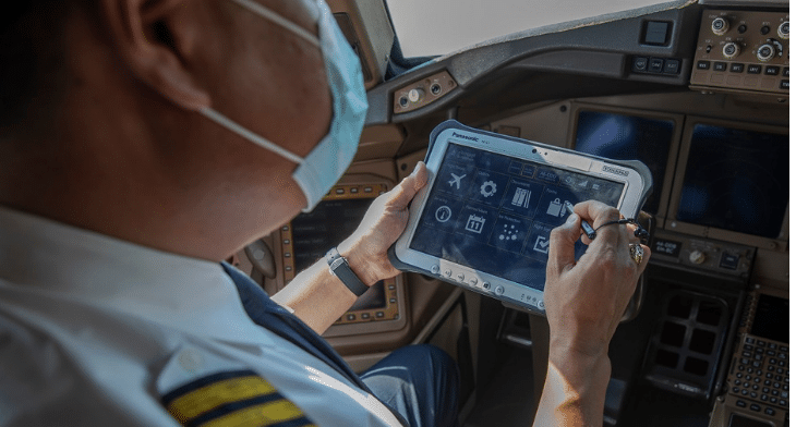 Etihad Airways pilot using eTech logs on tablet