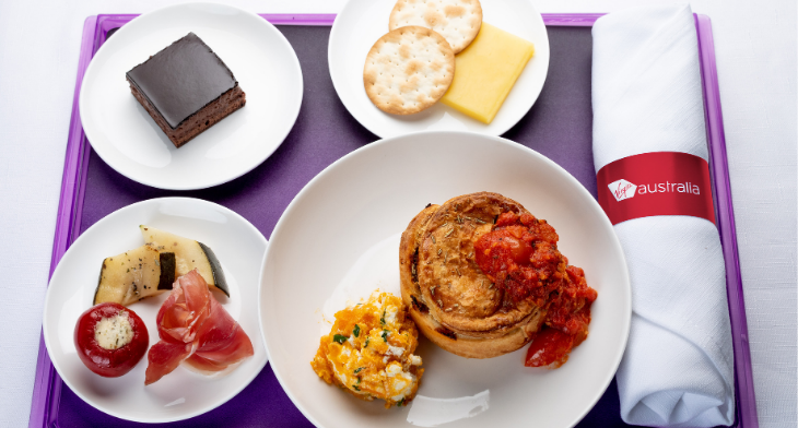 Lamb and rosemary pie with a pumpkin and feta smash, served alongside an antipasto plate with prosciutto, cheese and crackers_chocolate delight cake_Business Class offering from Virgin Aus