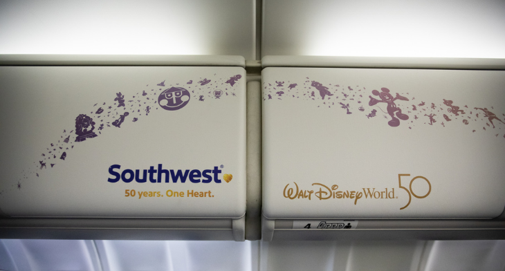 The Boeing 737-700 features 50th anniversary logos of both Southwest Airlines and Walt Disney World Resort
